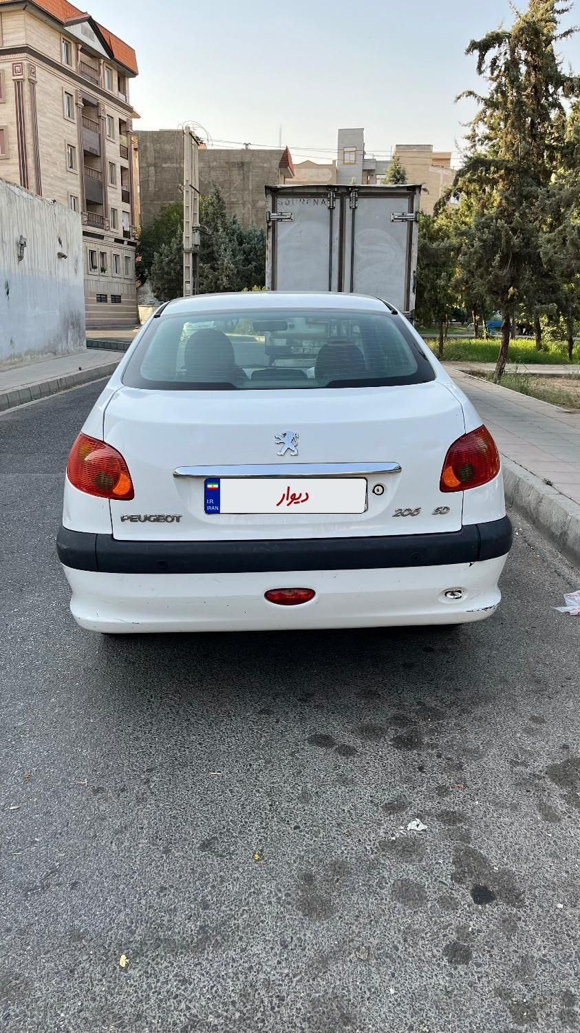 پژو ۲۰۶ صندوق دار v8 - 1393