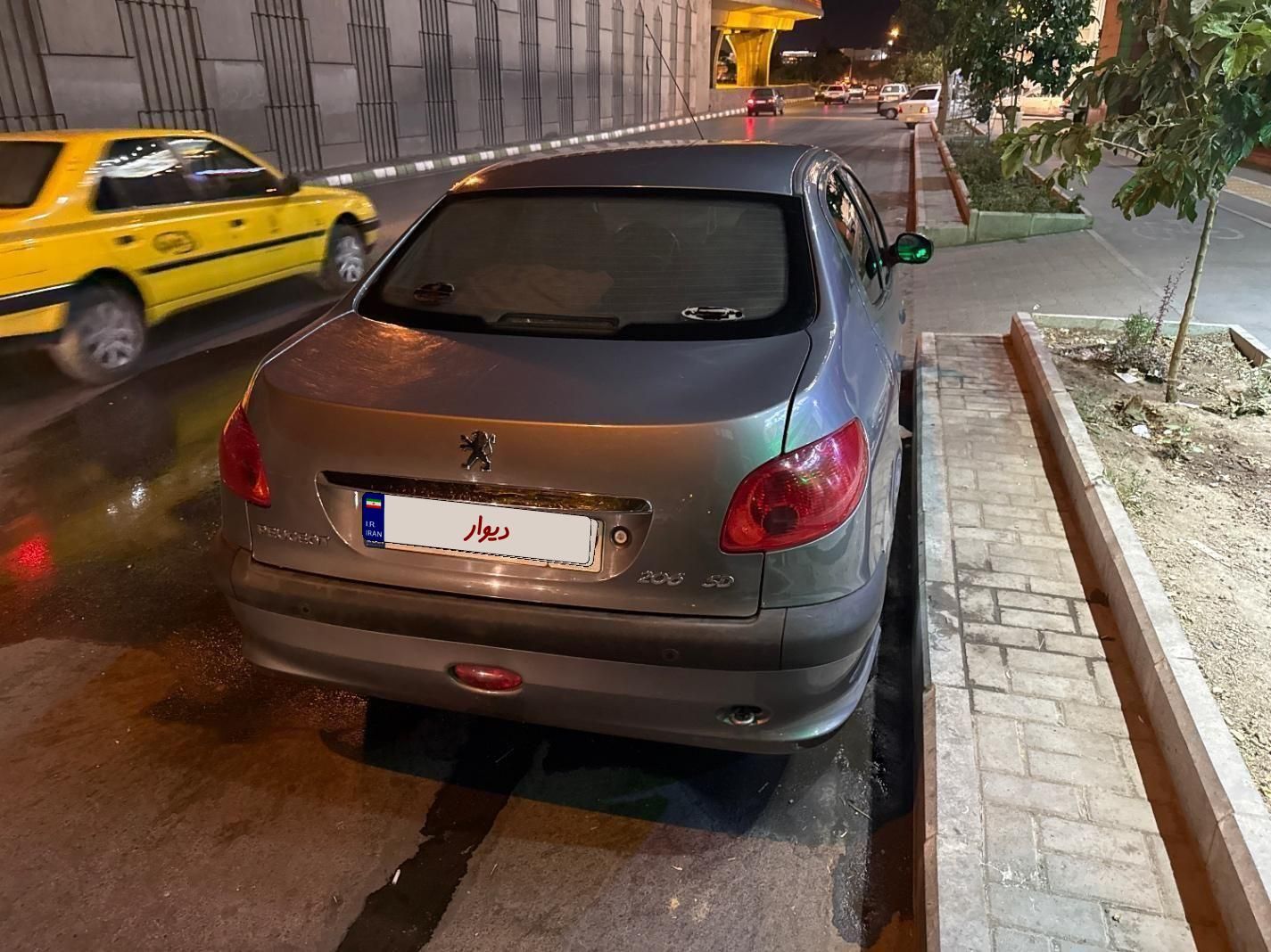 پژو ۲۰۶ صندوق دار v8 - 1394