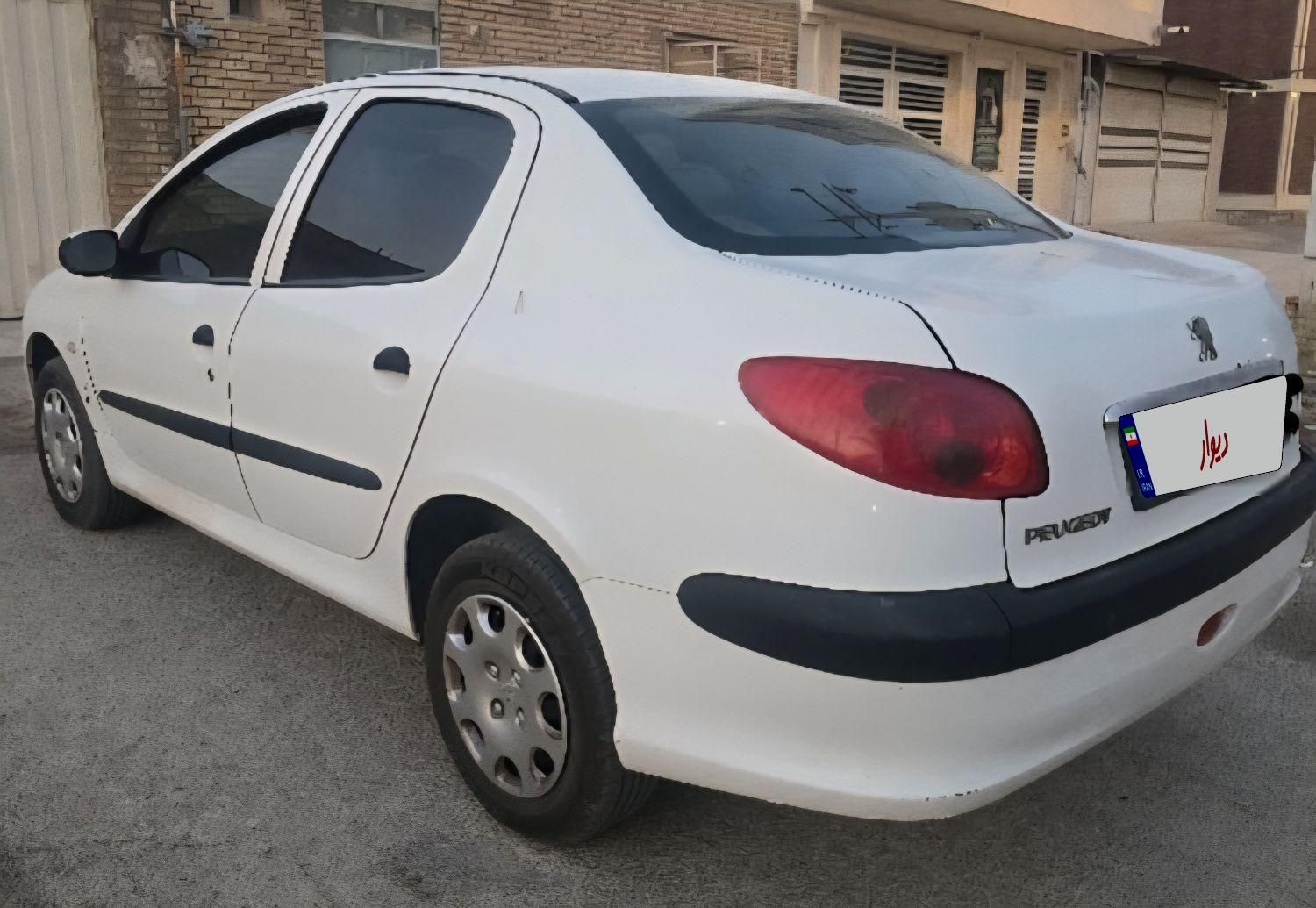 پژو ۲۰۶ صندوق دار v8 - 1396