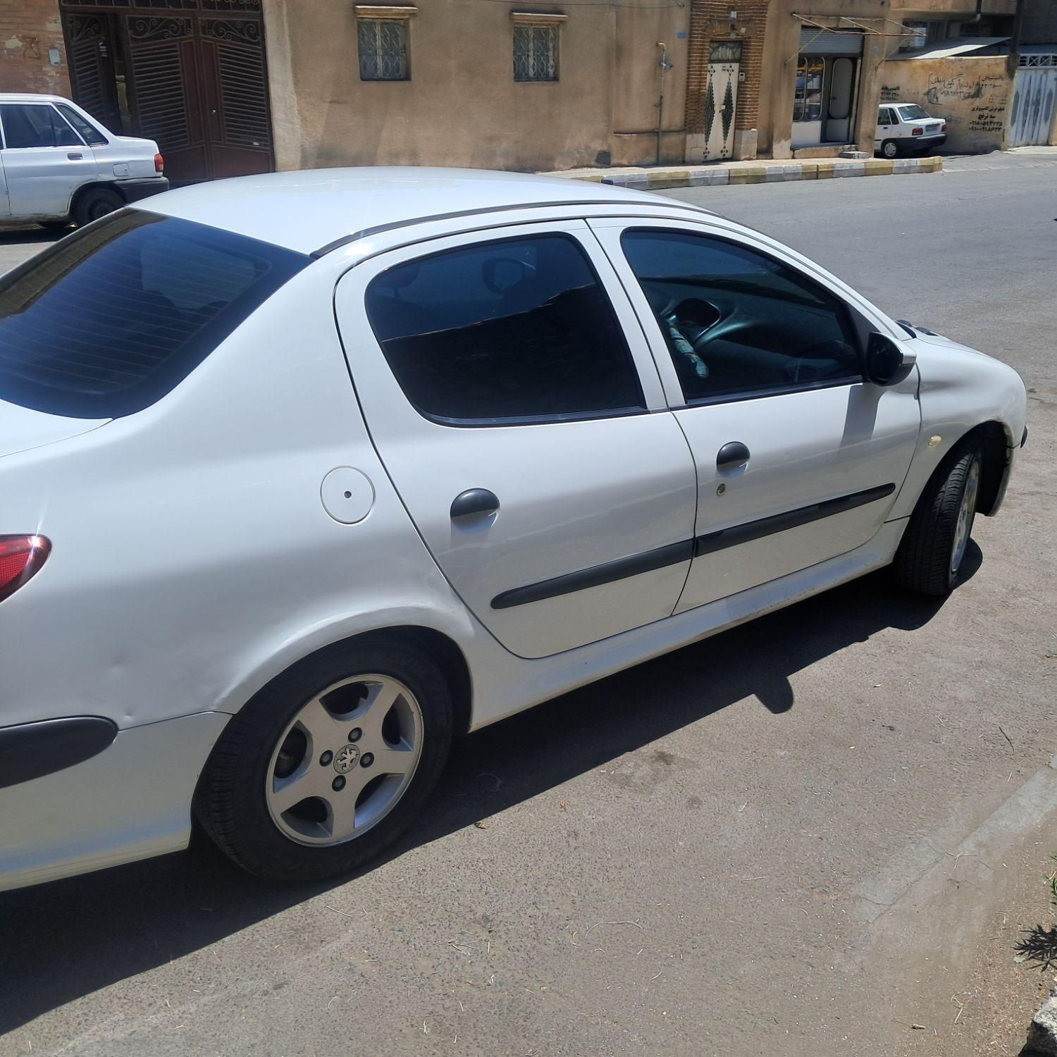 پژو ۲۰۶ صندوق دار v8 - 1394