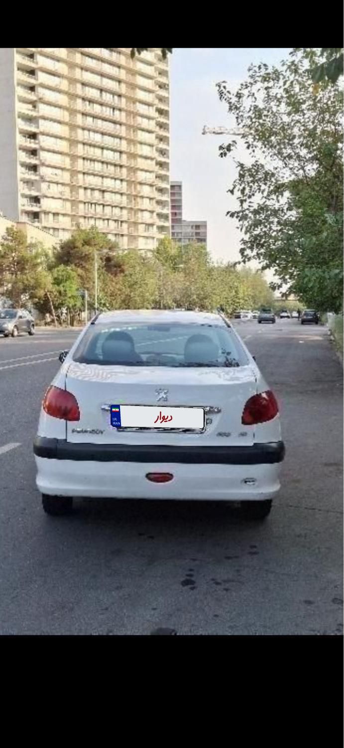 پژو ۲۰۶ صندوق دار v8 - 1397