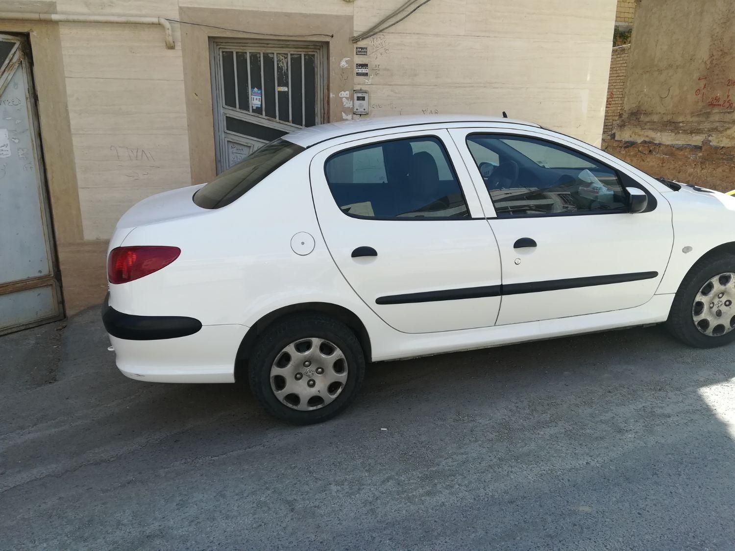 پژو ۲۰۶ صندوق دار v8 - 1397