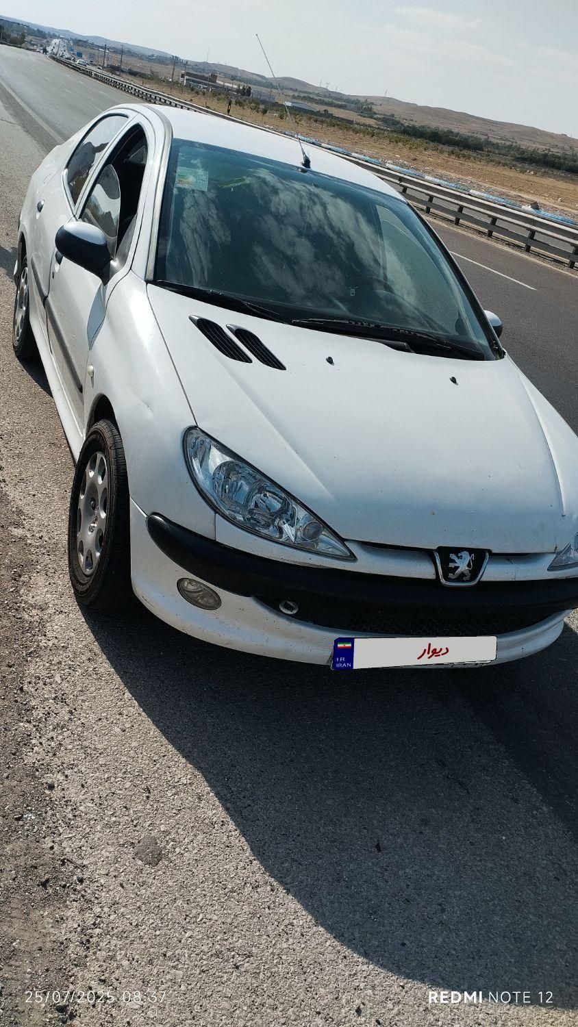 پژو ۲۰۶ صندوق دار v8 - 1394