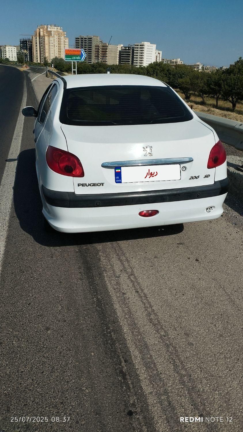 پژو ۲۰۶ صندوق دار v8 - 1394