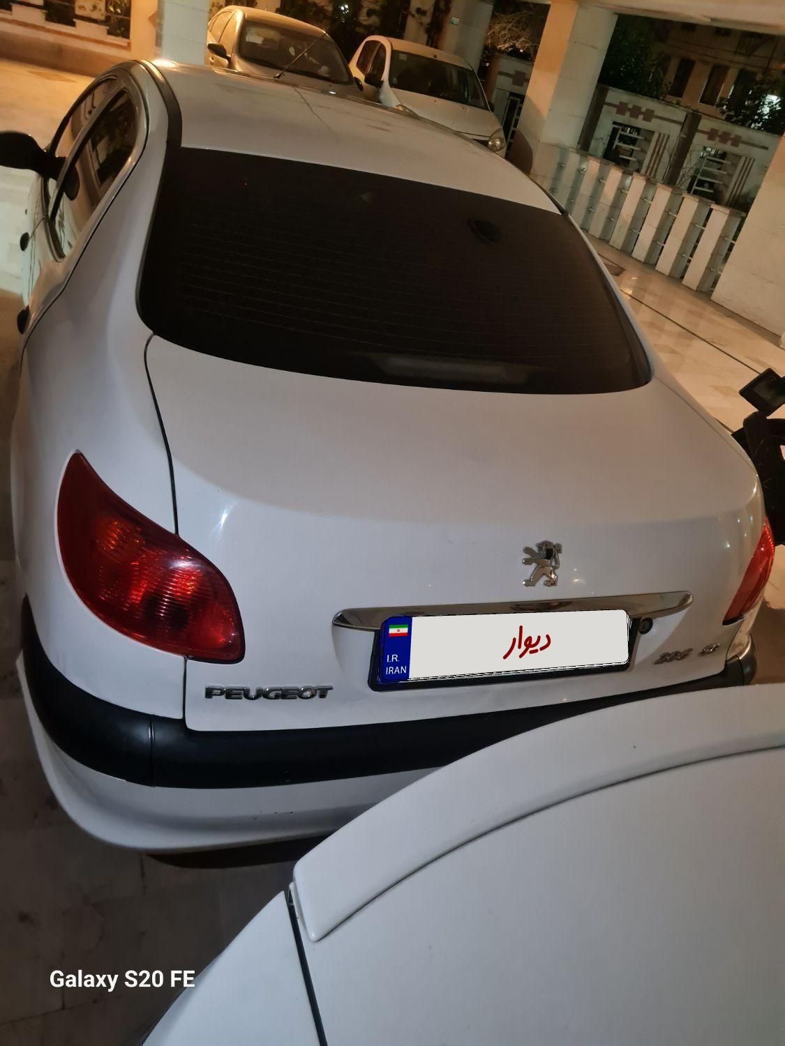 پژو ۲۰۶ صندوق دار v8 - 1396