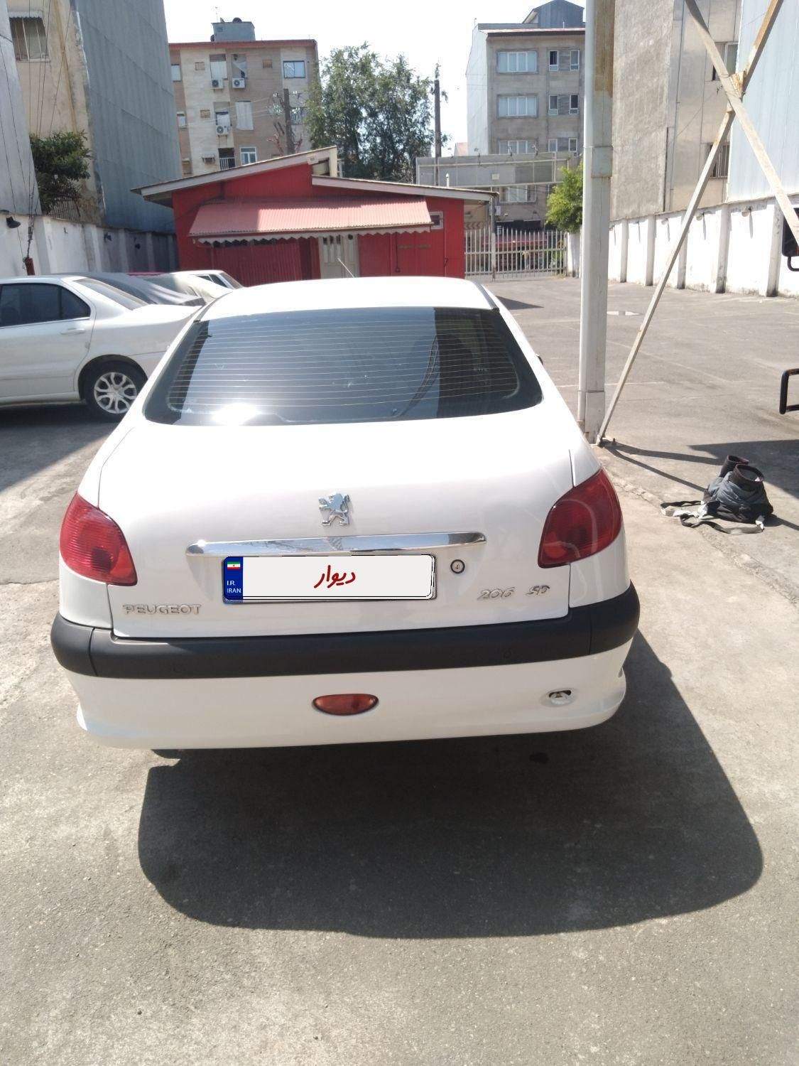 پژو ۲۰۶ صندوق دار v8 - 1396