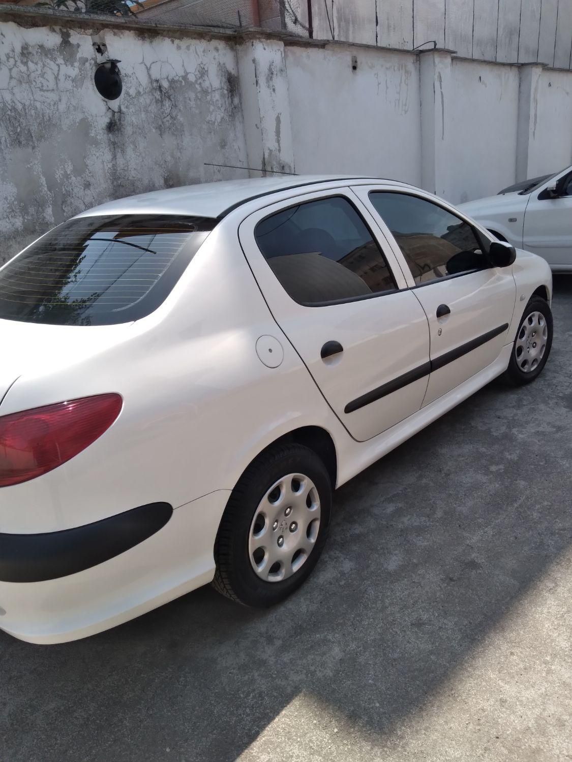 پژو ۲۰۶ صندوق دار v8 - 1396
