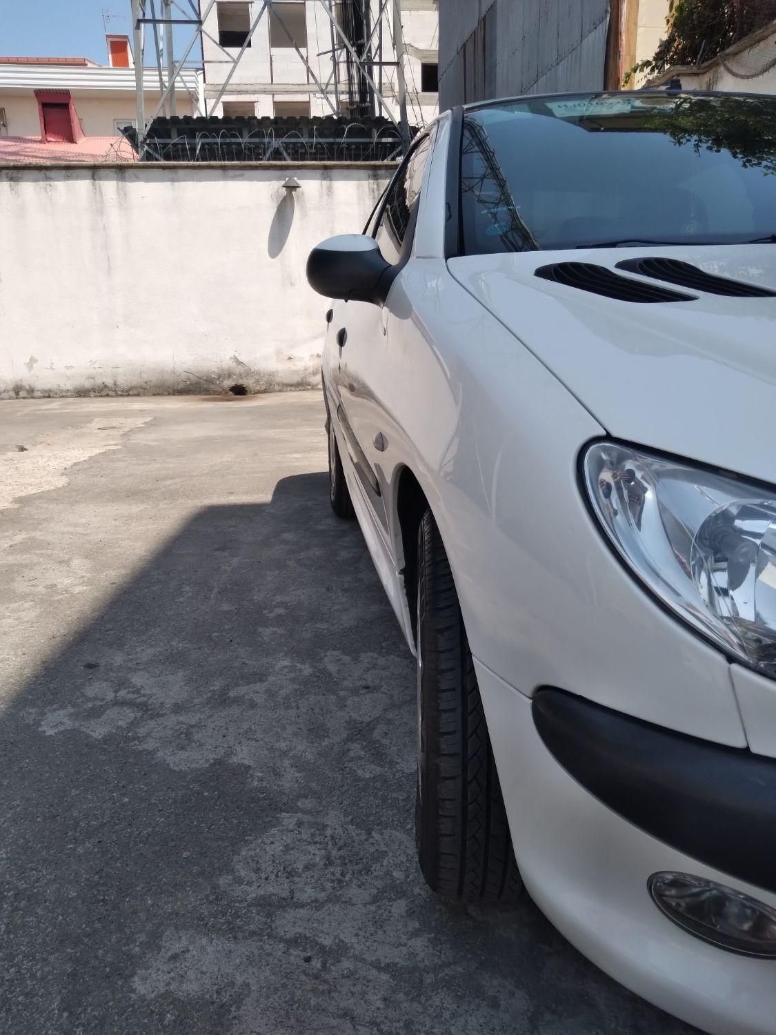 پژو ۲۰۶ صندوق دار v8 - 1396