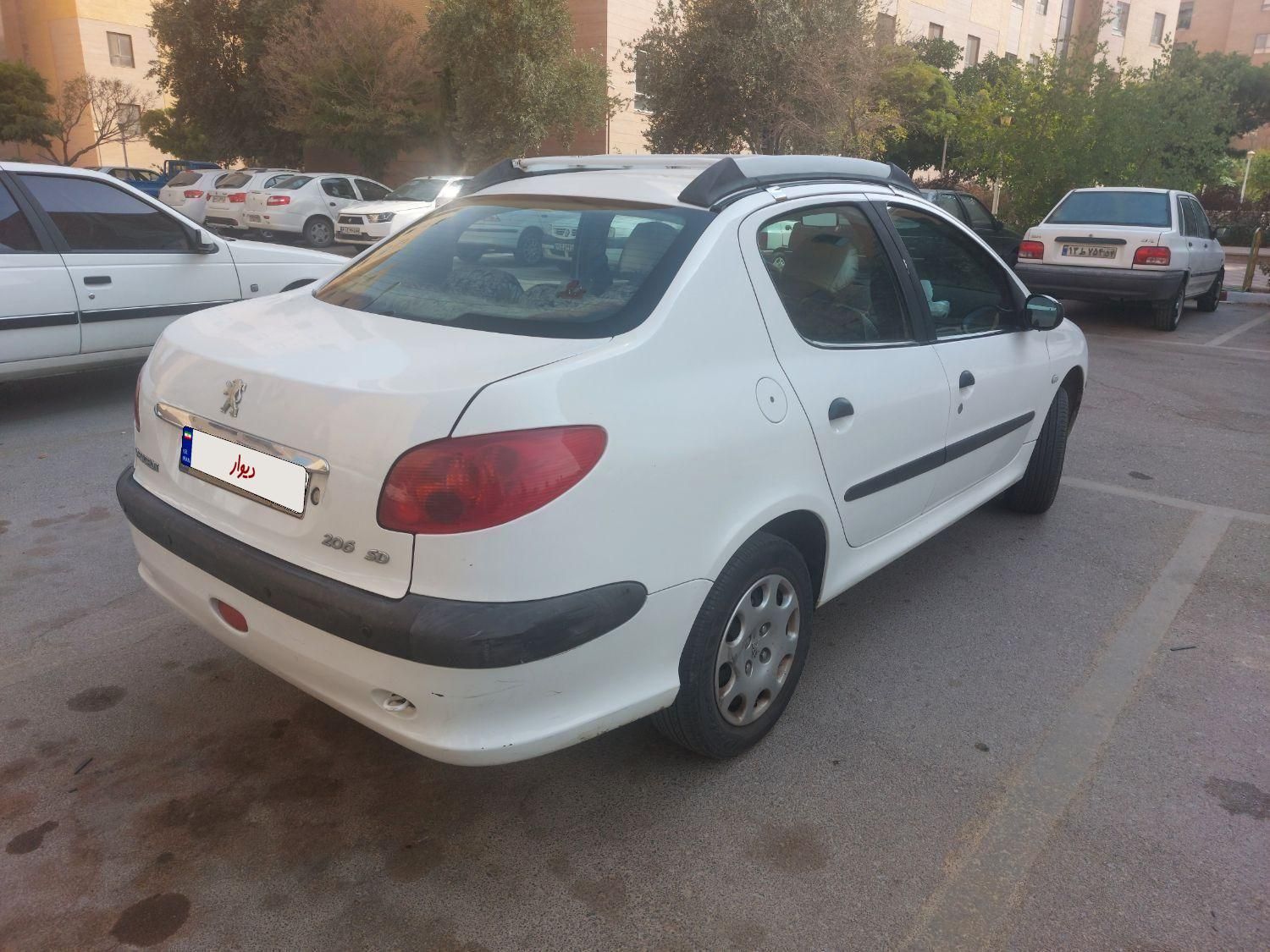 پژو ۲۰۶ صندوق دار v8 - 1391