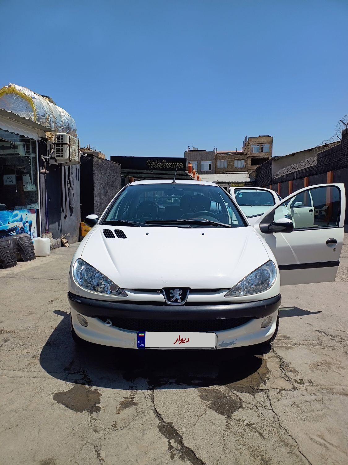 پژو ۲۰۶ صندوق دار v8 - 1394