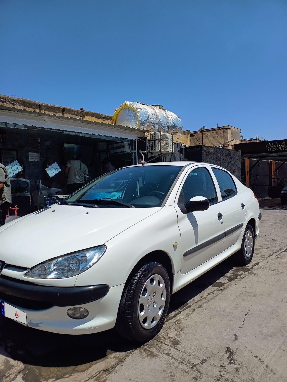 پژو ۲۰۶ صندوق دار v8 - 1394