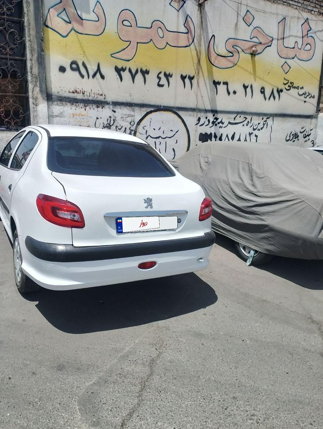 پژو ۲۰۶ صندوق دار v2 - 1390