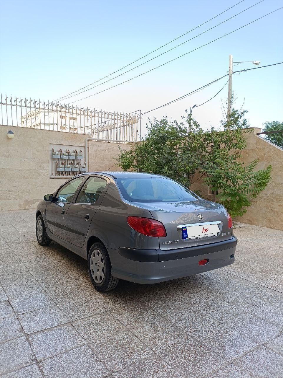 پژو ۲۰۶ صندوق دار v8 - 1395