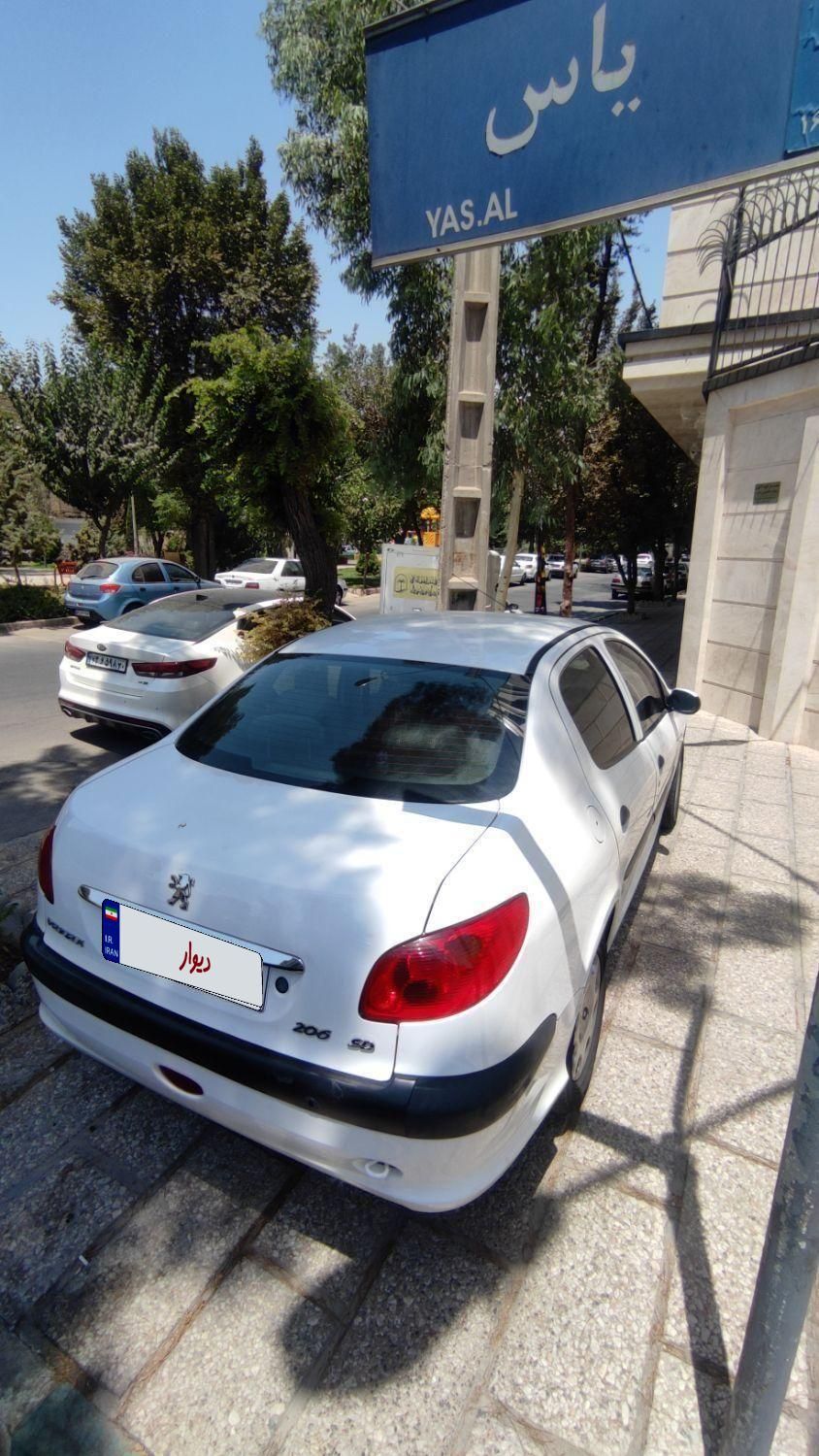 پژو ۲۰۶ صندوق دار v8 - 1397