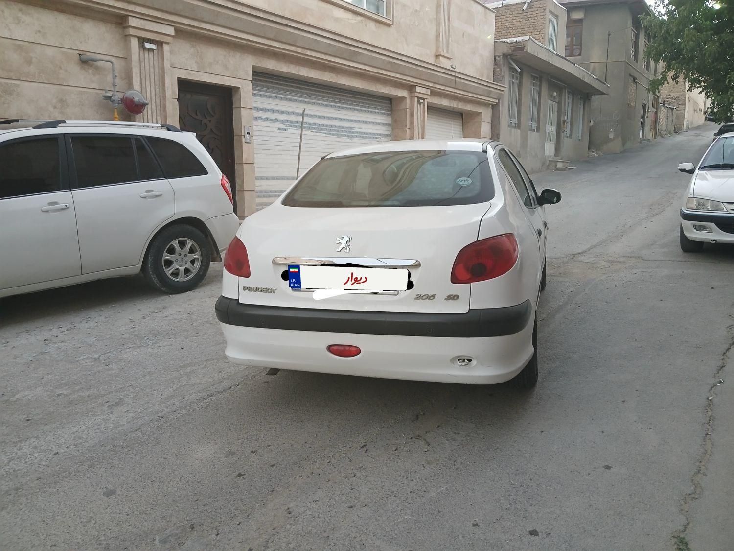 پژو ۲۰۶ صندوق دار v8 - 1396