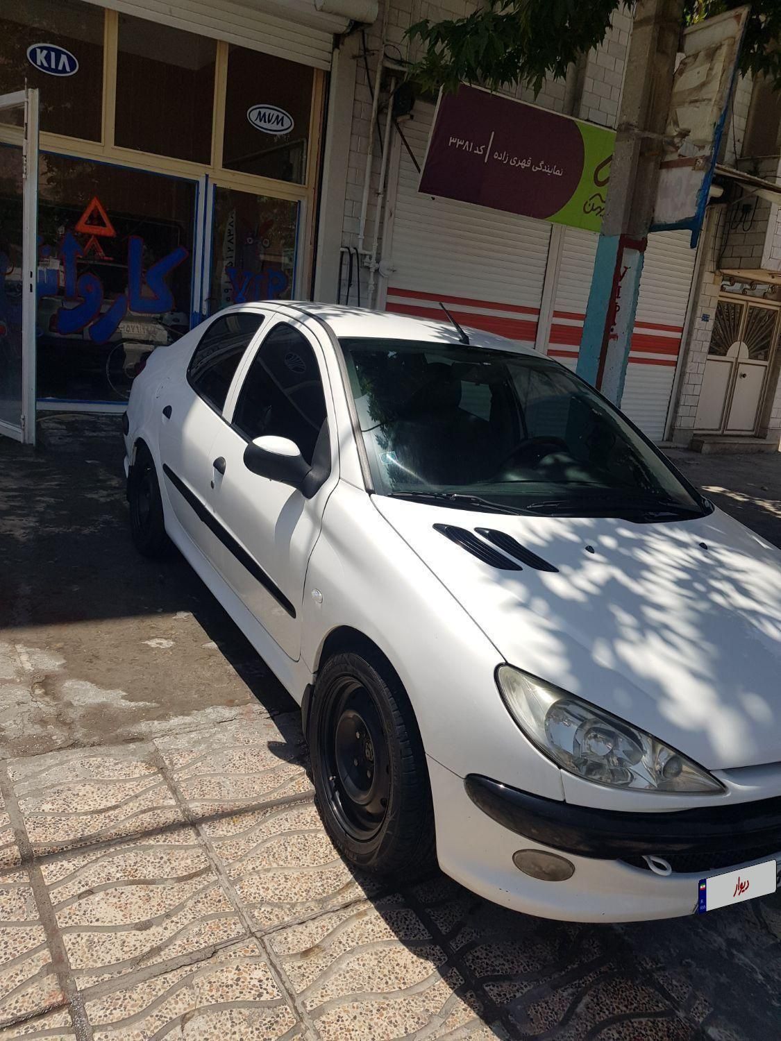 پژو ۲۰۶ صندوق دار v8 - 1395