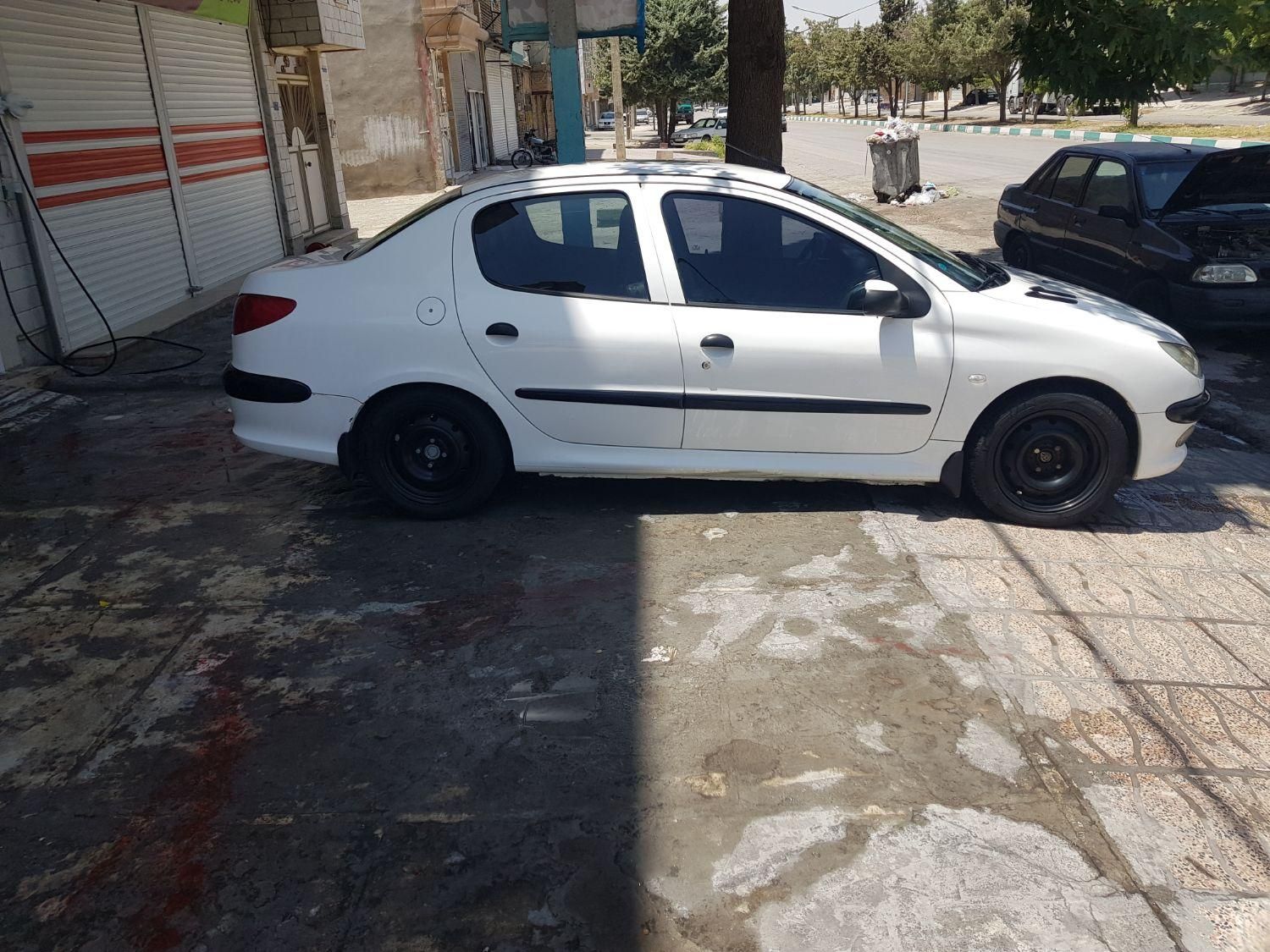 پژو ۲۰۶ صندوق دار v8 - 1395