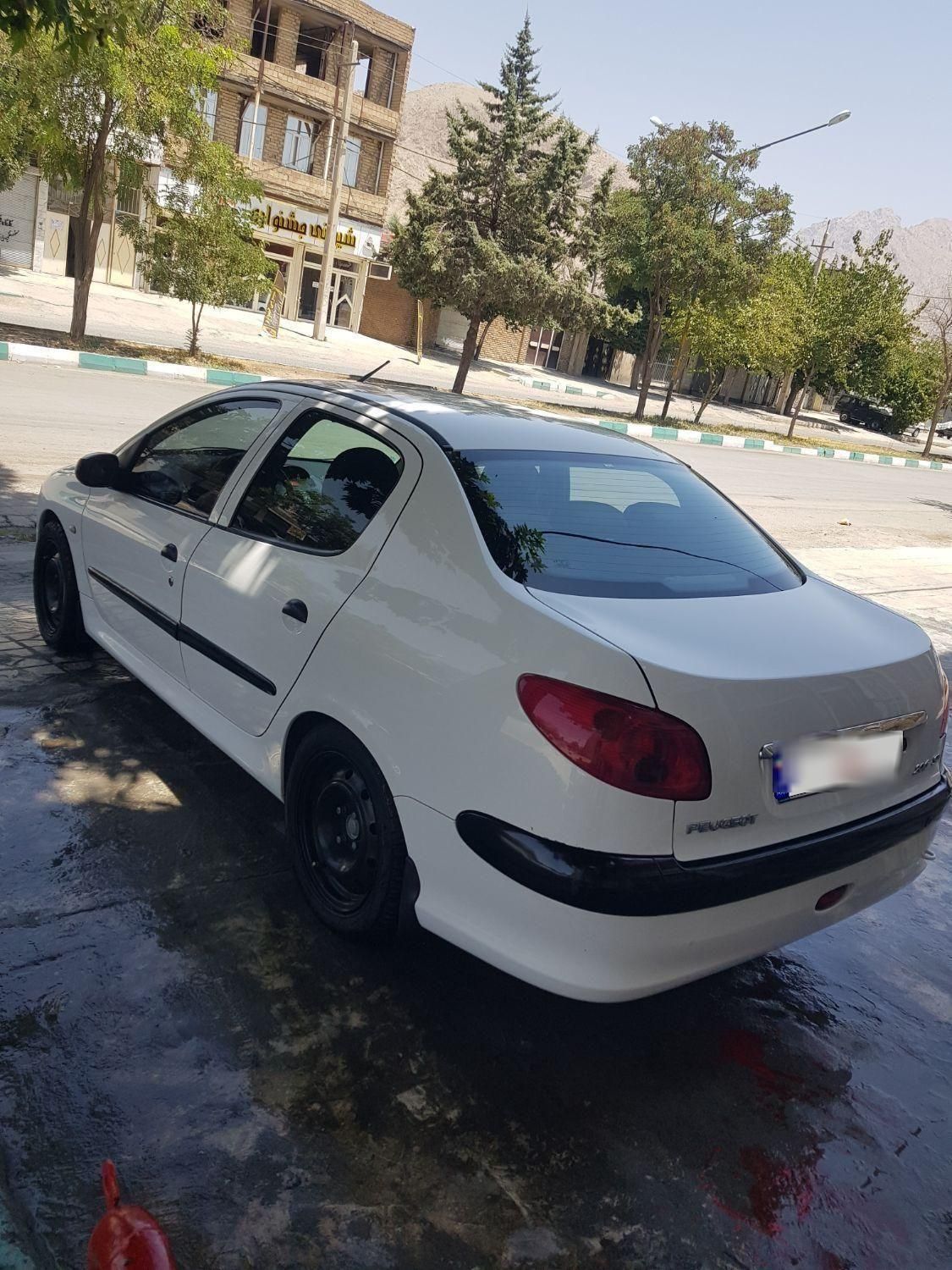 پژو ۲۰۶ صندوق دار v8 - 1395