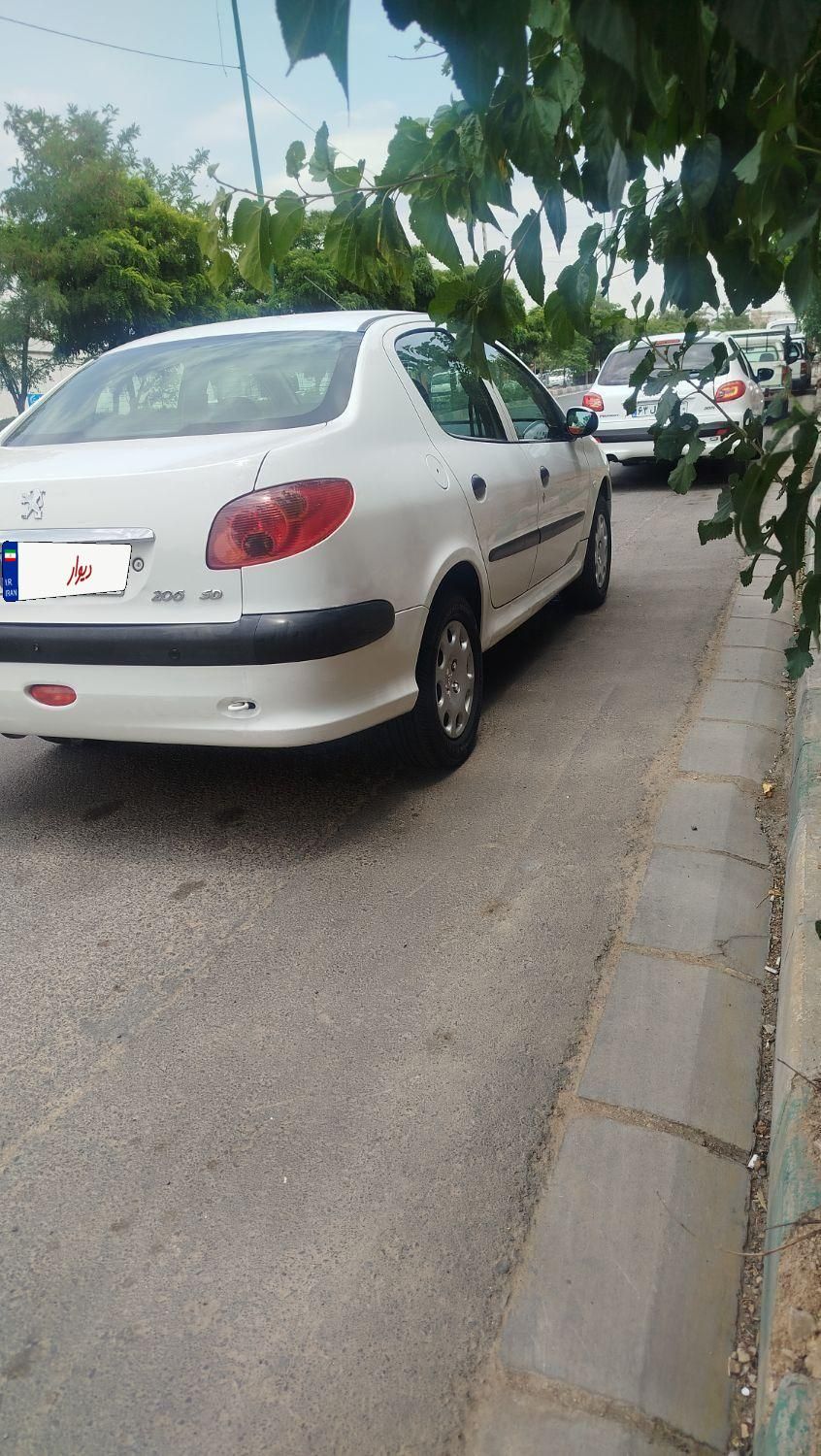 پژو ۲۰۶ صندوق دار v8 - 1394