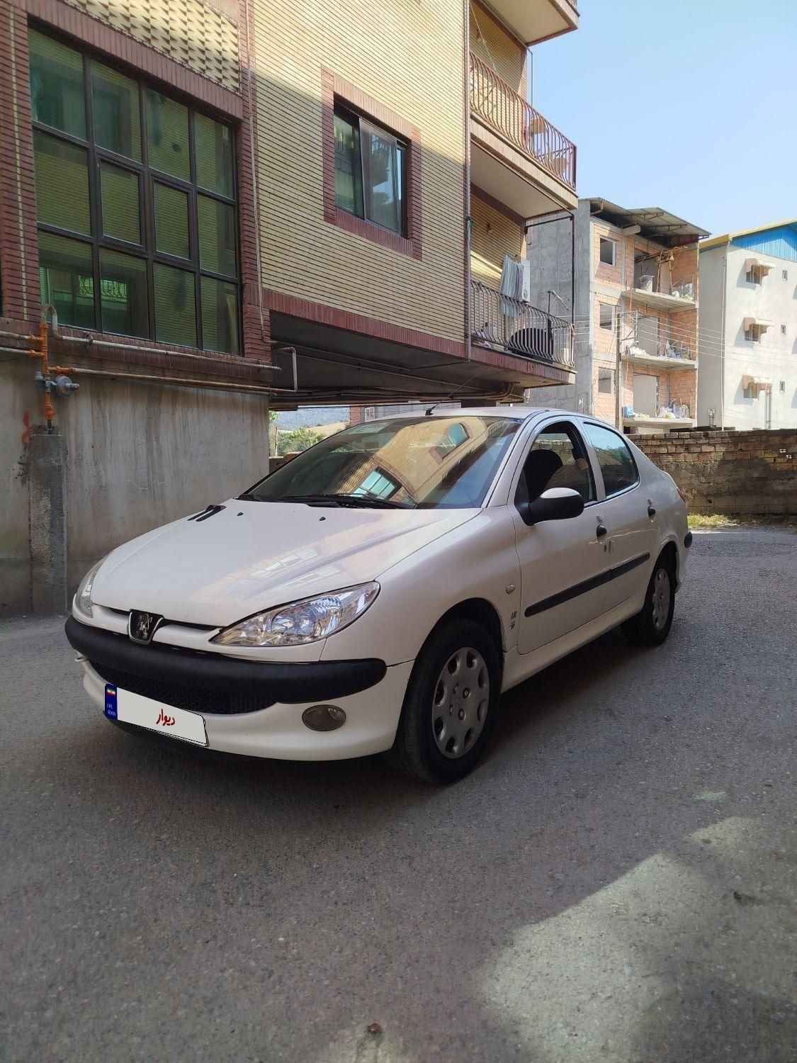 پژو ۲۰۶ صندوق دار v8 - 1397