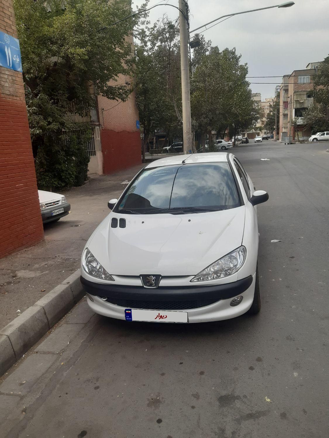 پژو ۲۰۶ صندوق دار v8 - 1398