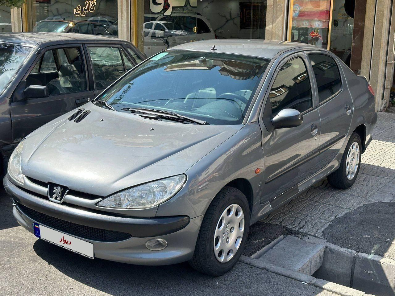 پژو ۲۰۶ صندوق دار v8 - 1395