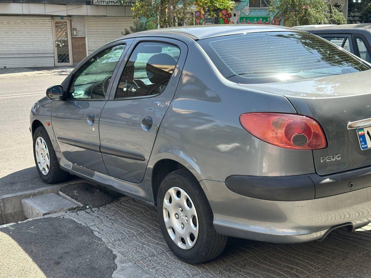 پژو ۲۰۶ صندوق دار v8 - 1395
