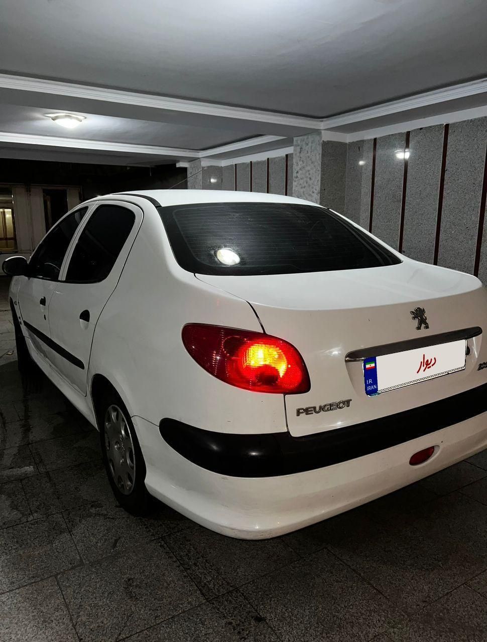 پژو ۲۰۶ صندوق دار v8 - 1395