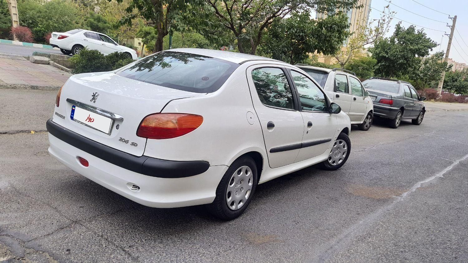 پژو ۲۰۶ صندوق دار v8 - 1390