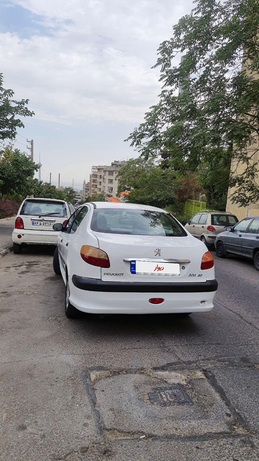 پژو ۲۰۶ صندوق دار v8 - 1390