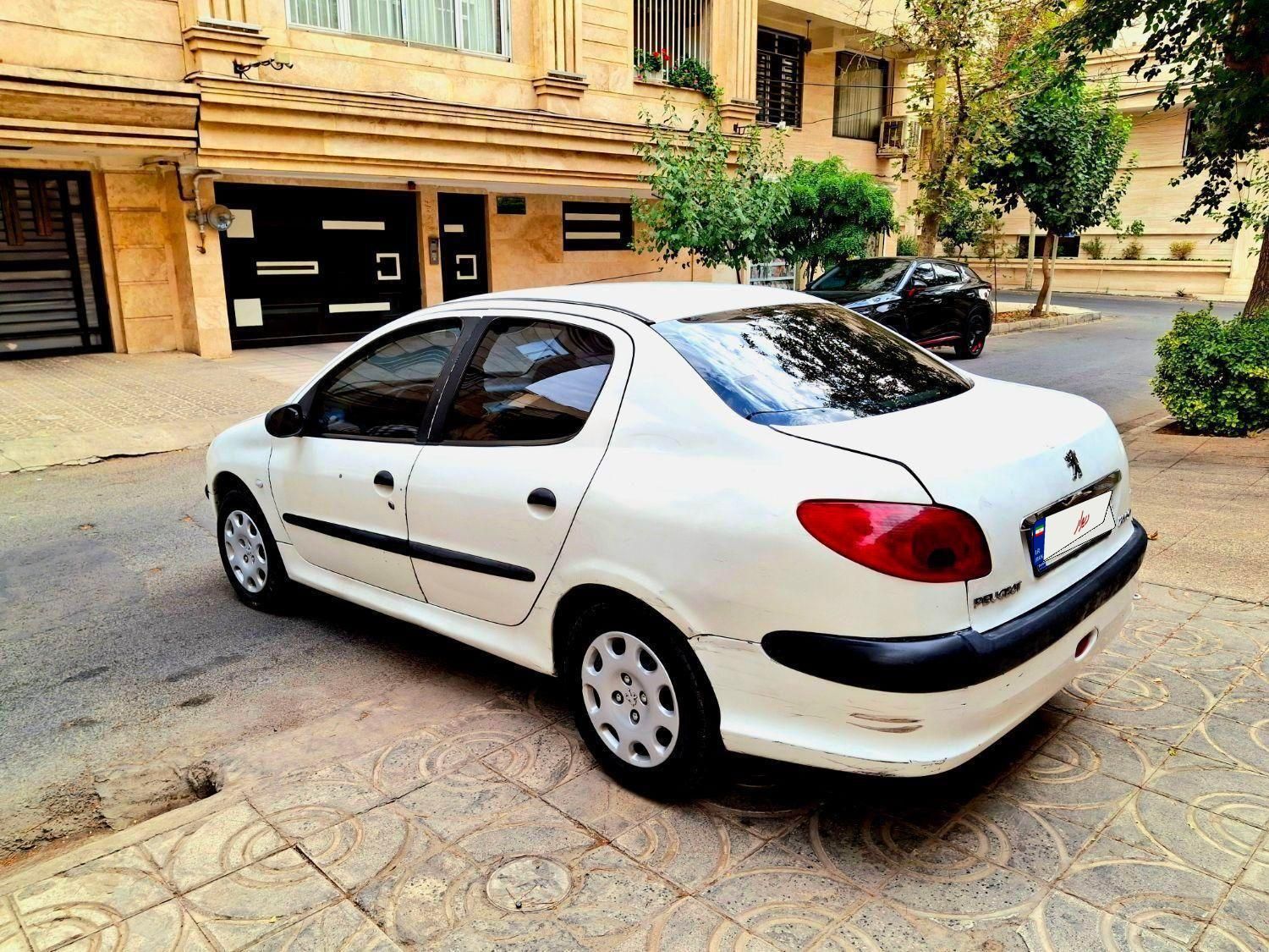 پژو ۲۰۶ صندوق دار v8 - 1390