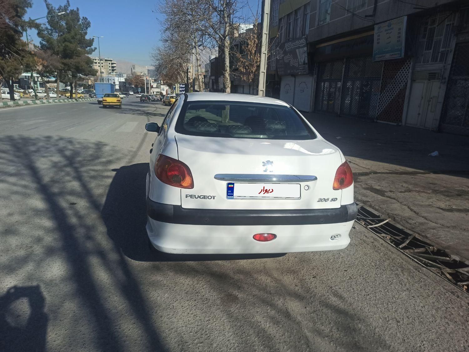 پژو ۲۰۶ صندوق دار v8 - 1393