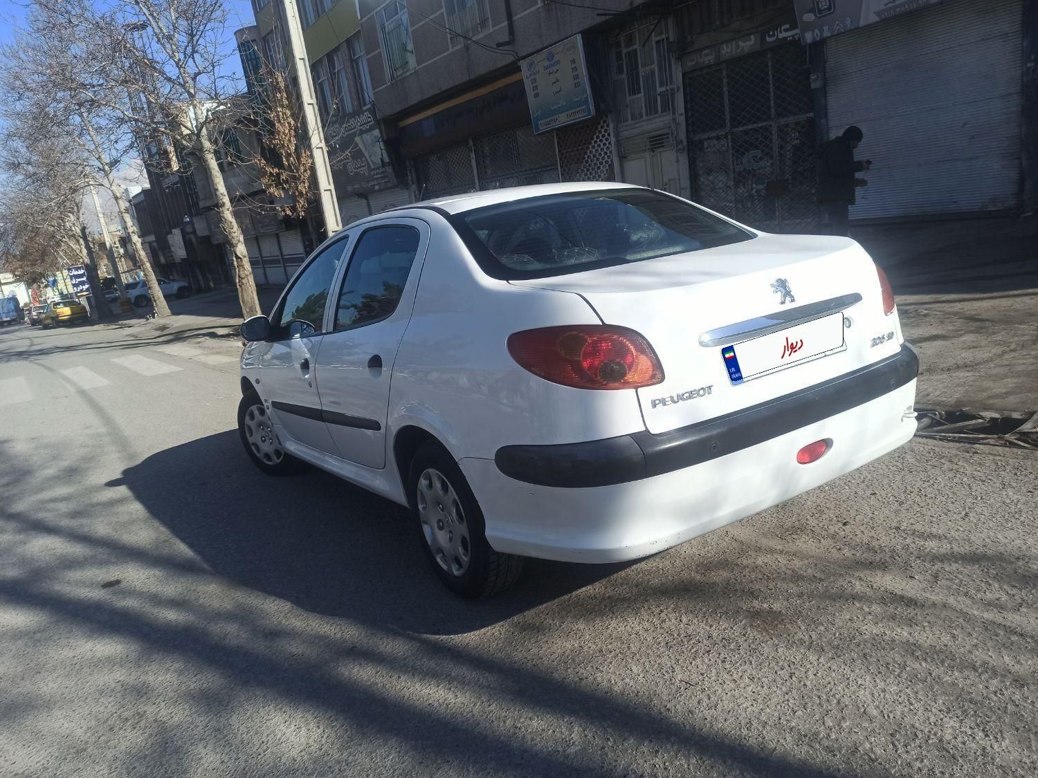 پژو ۲۰۶ صندوق دار v8 - 1393