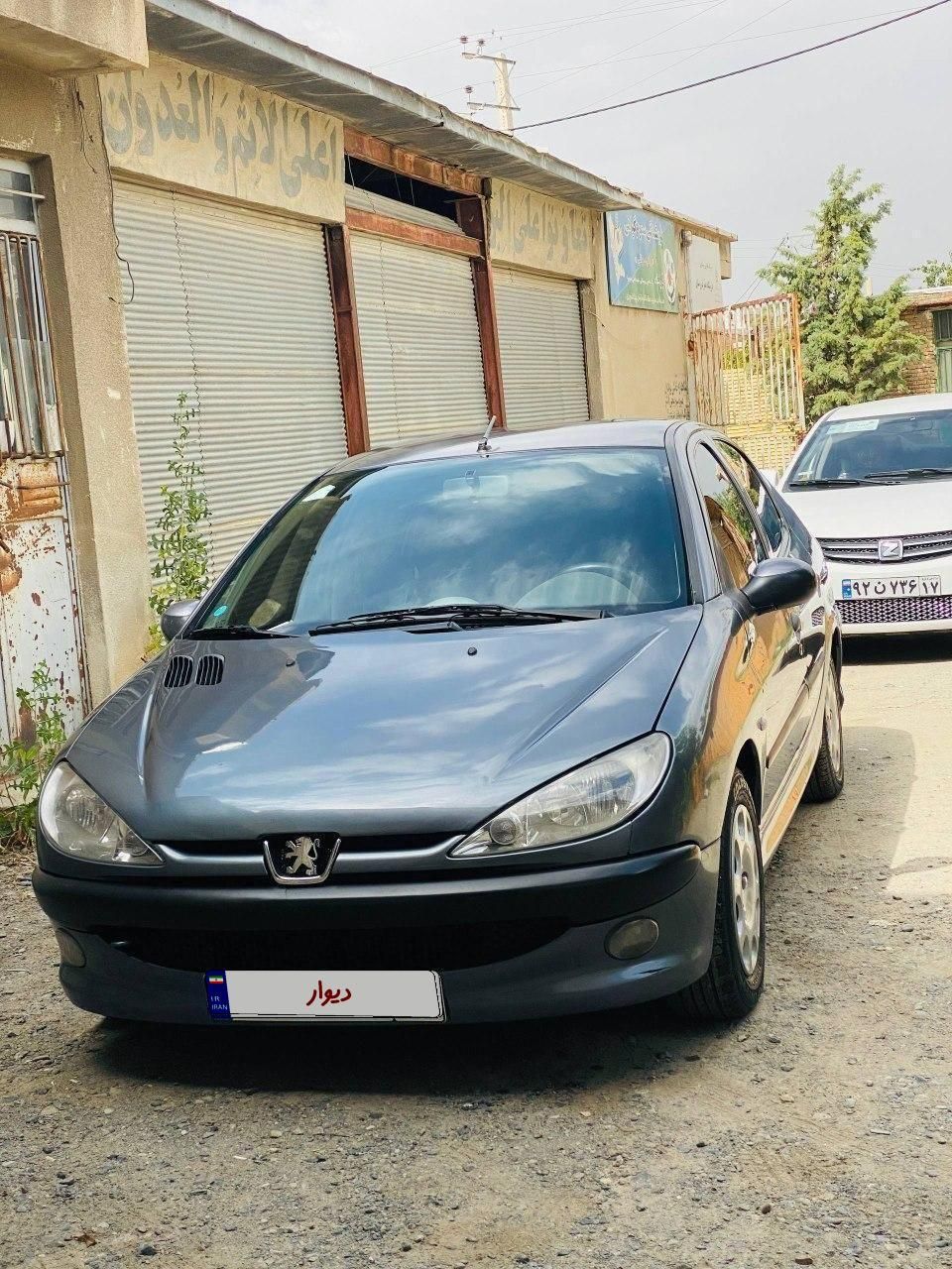 پژو ۲۰۶ صندوق دار v8 - 1390