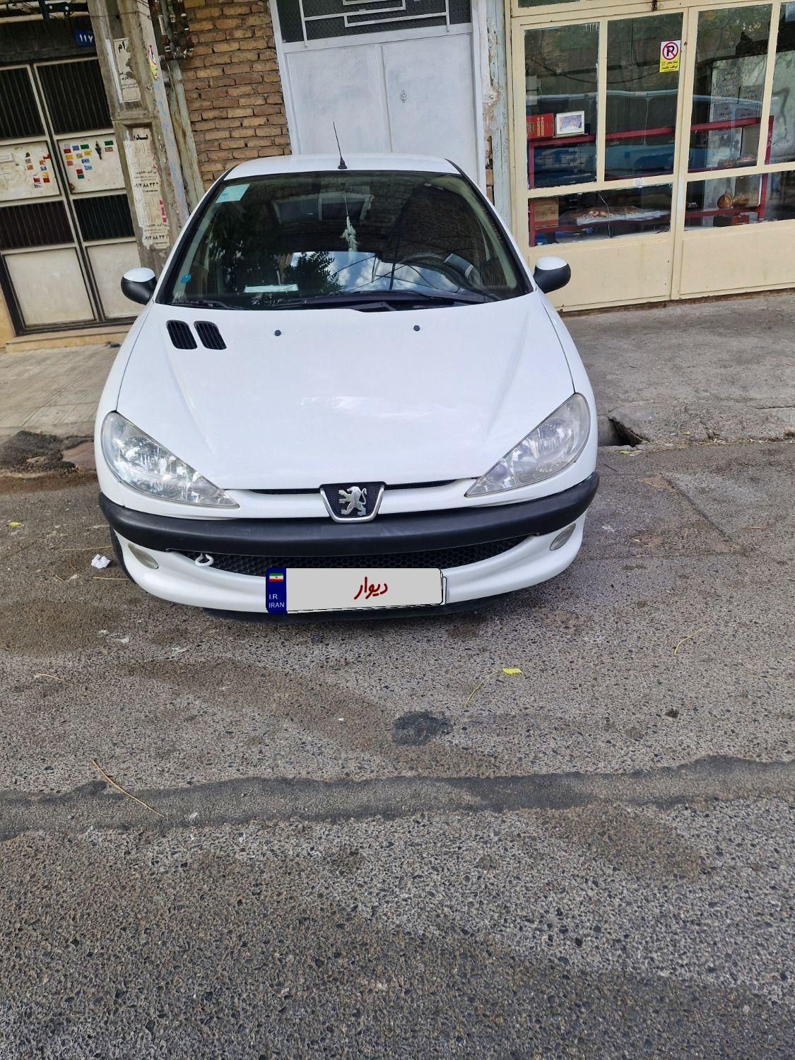 پژو ۲۰۶ صندوق دار v8 - 1395