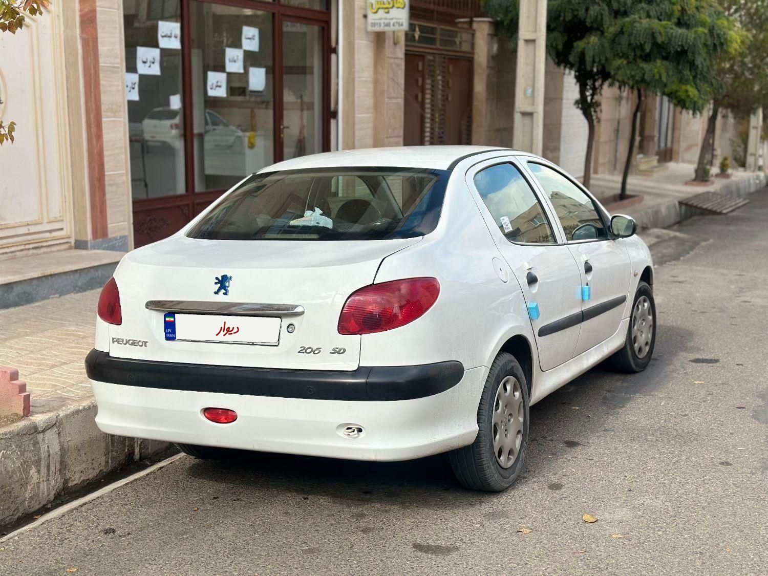 پژو ۲۰۶ صندوق دار v8 - 1393