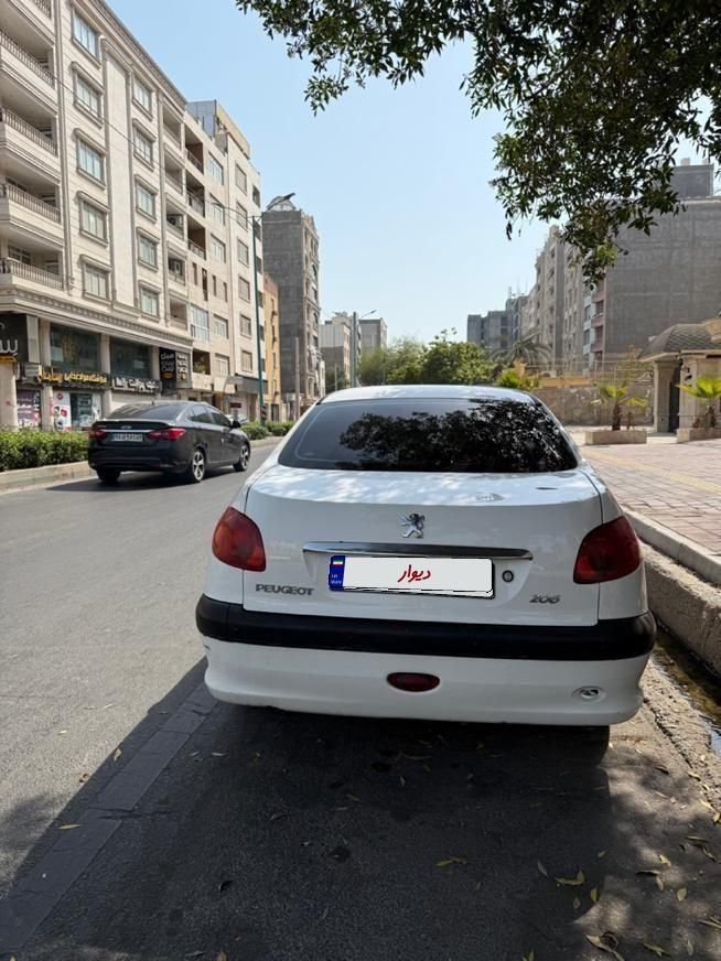 پژو ۲۰۶ صندوق دار v8 - 1390