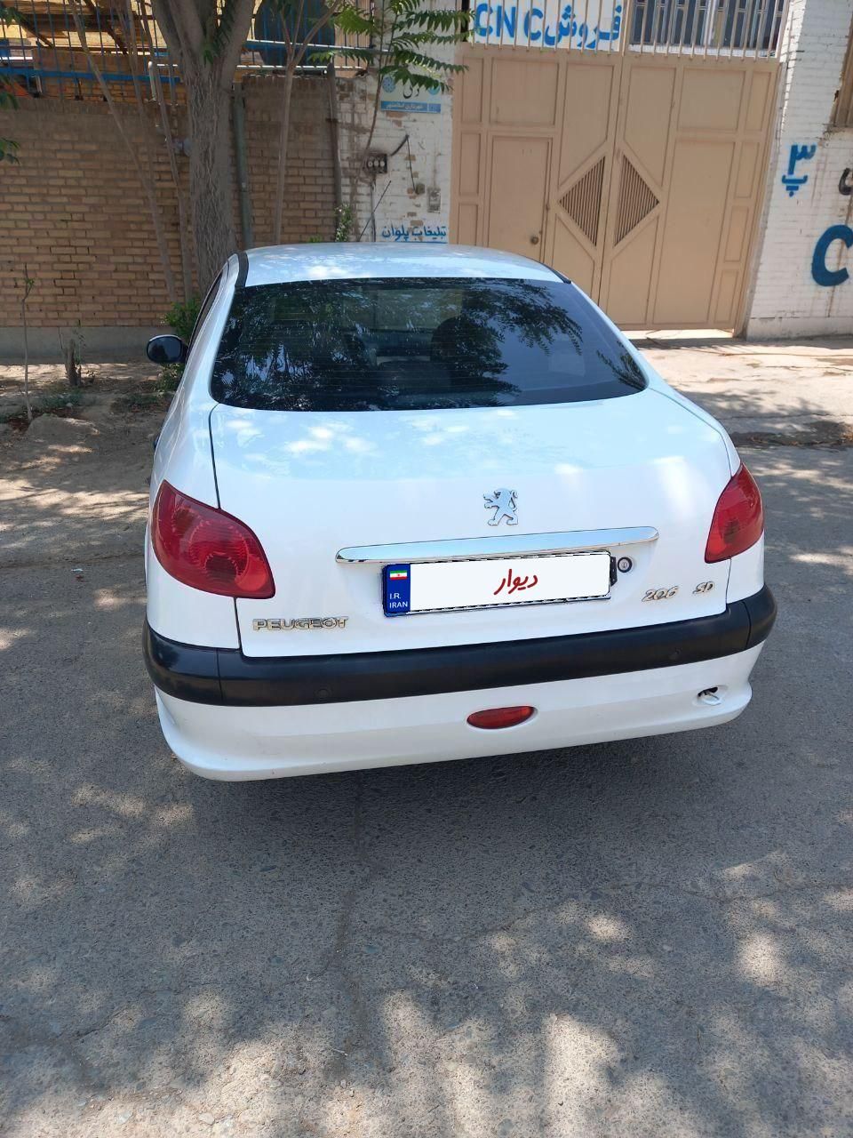 پژو ۲۰۶ صندوق دار v8 - 1395