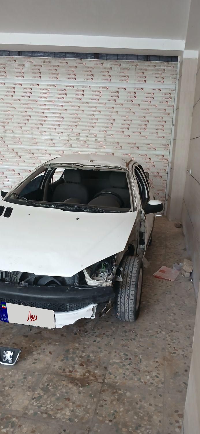 پژو ۲۰۶ صندوق دار v8 - 1396