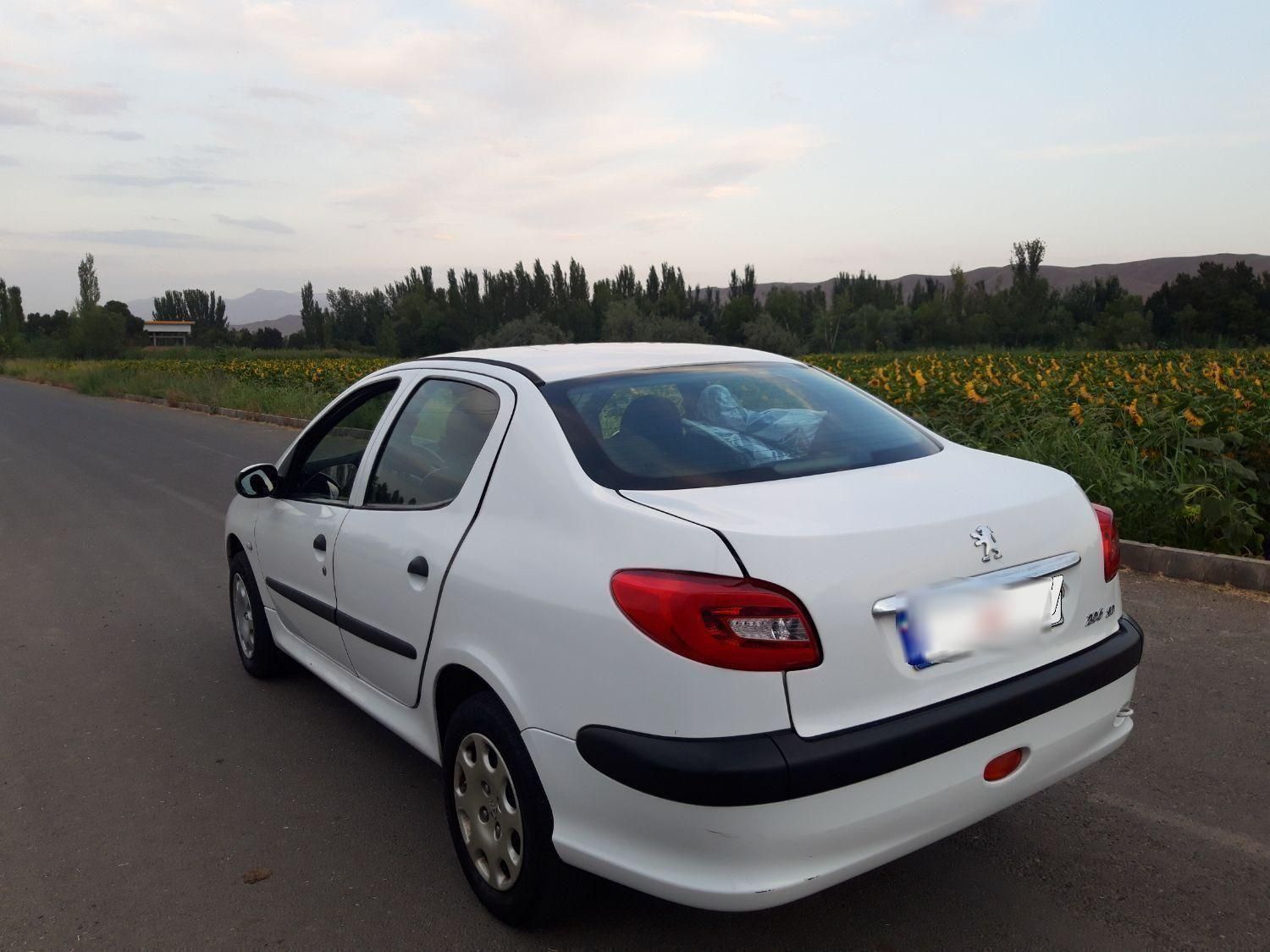 پژو ۲۰۶ صندوق دار v8 - 1394