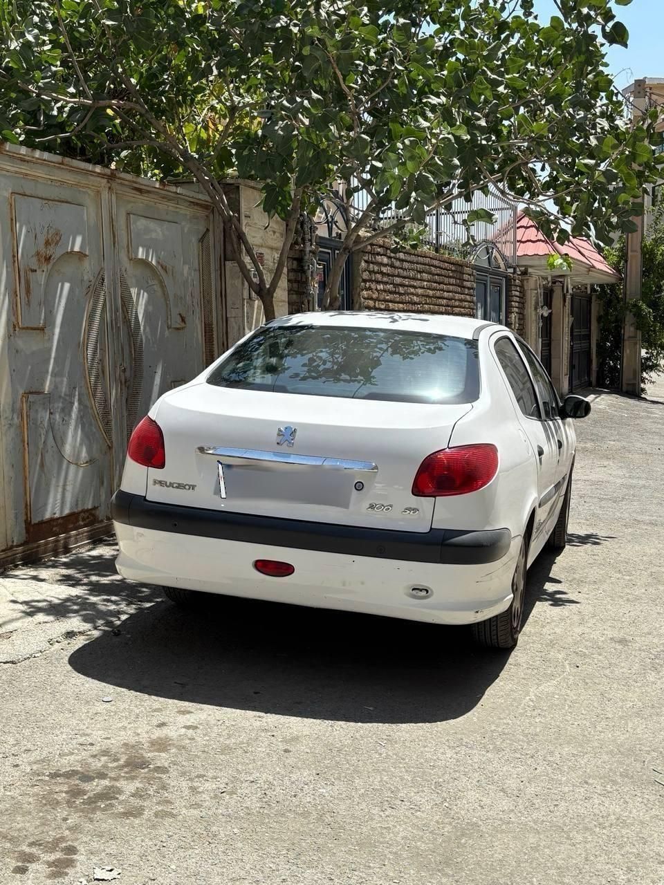 پژو ۲۰۶ صندوق دار v8 - 1397