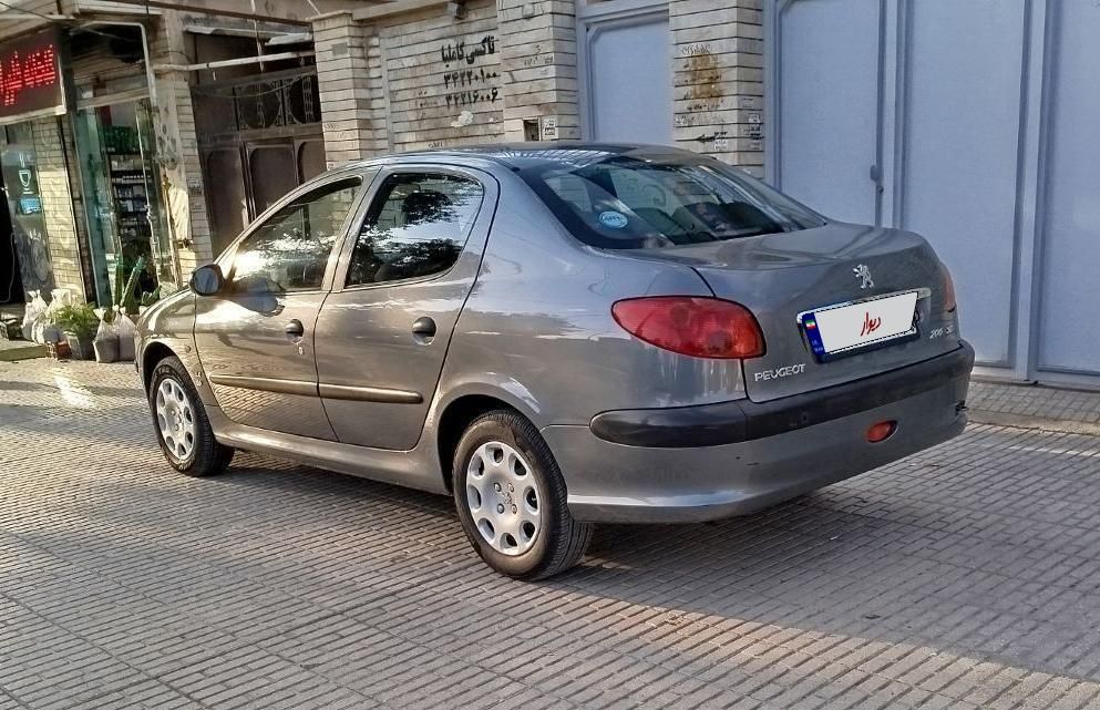 پژو ۲۰۶ صندوق دار v8 - 1396