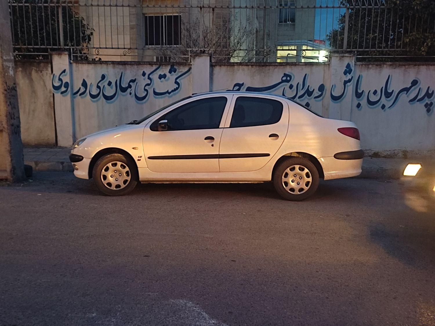 پژو ۲۰۶ صندوق دار v8 - 1397