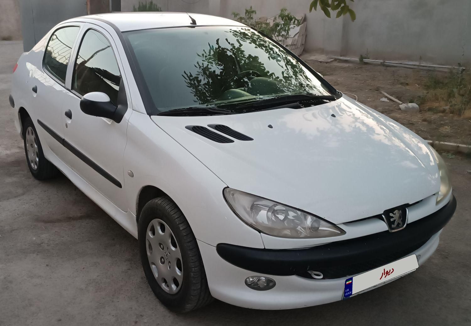 پژو ۲۰۶ صندوق دار v8 - 1397