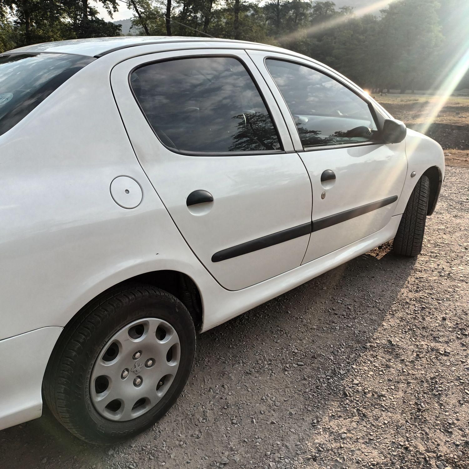 پژو ۲۰۶ صندوق دار v8 - 1394