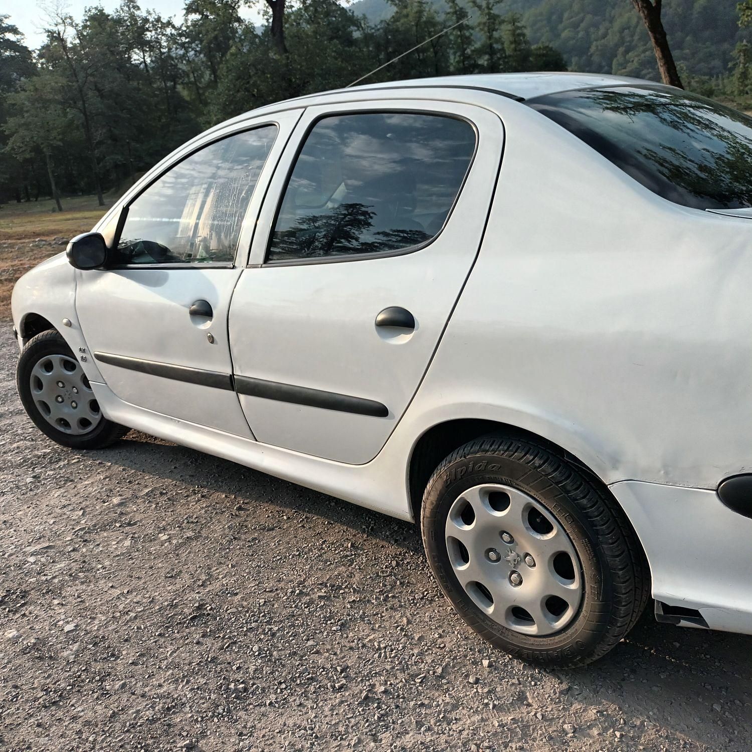پژو ۲۰۶ صندوق دار v8 - 1394