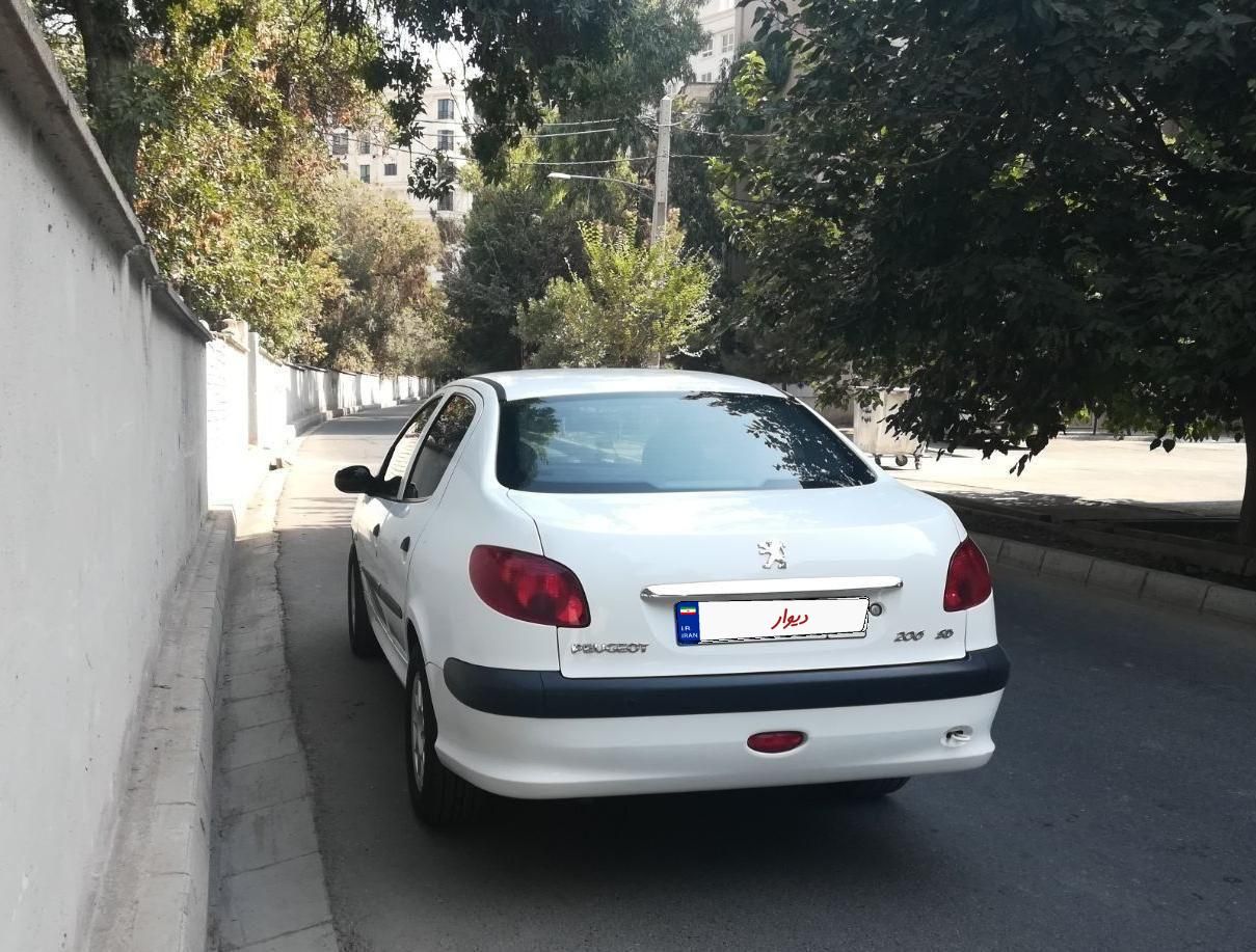 پژو ۲۰۶ صندوق دار v8 - 1398