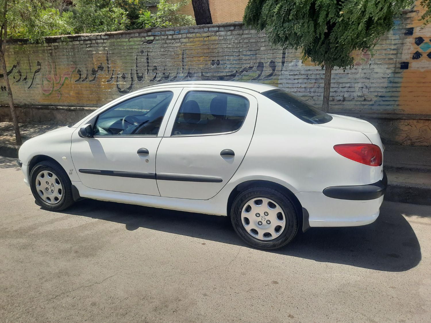 پژو ۲۰۶ صندوق دار v8 - 1396