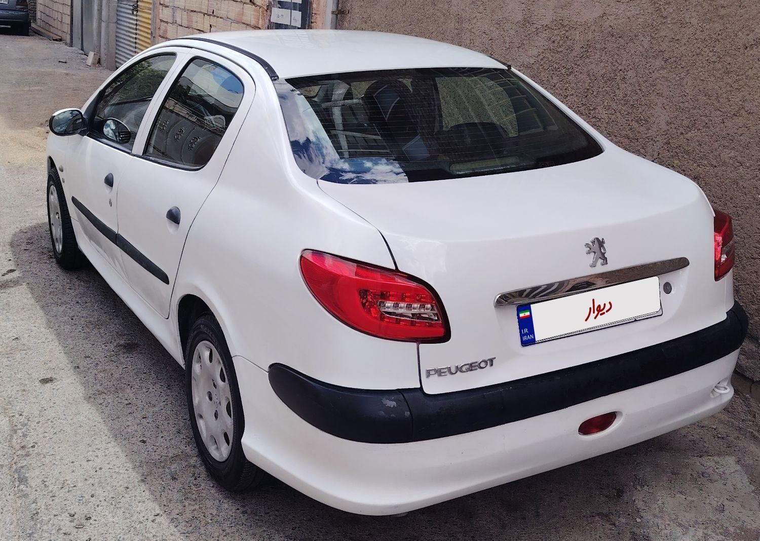 پژو ۲۰۶ صندوق دار v8 - 1393