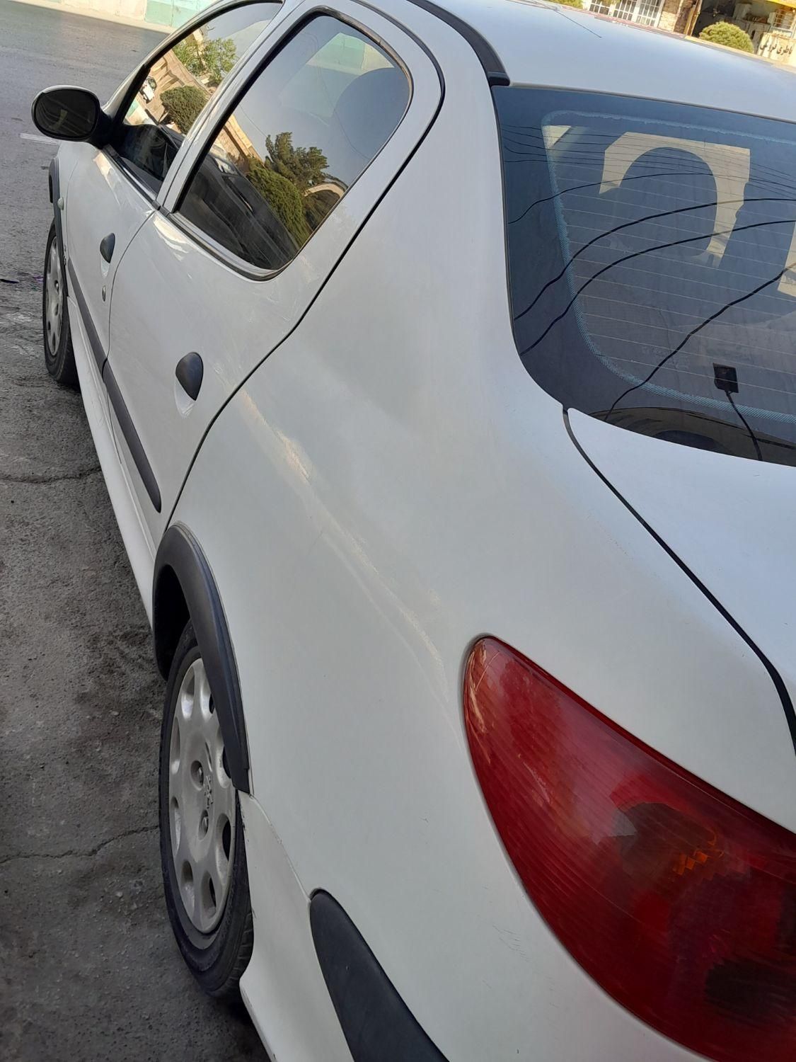 پژو ۲۰۶ صندوق دار v8 - 1394